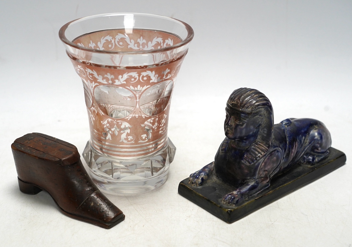 Sundry items comprising a Victorian flashed cut and engraved beaker, a 19th century model of a sphinx, and a green shoe snuff box. Condition - fair